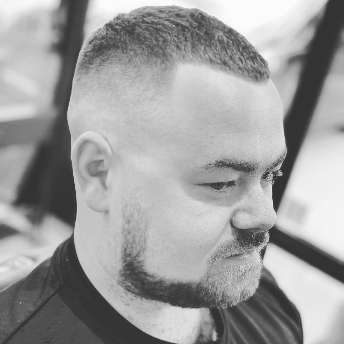 Low fade with natural finish styled by Kristian Brett