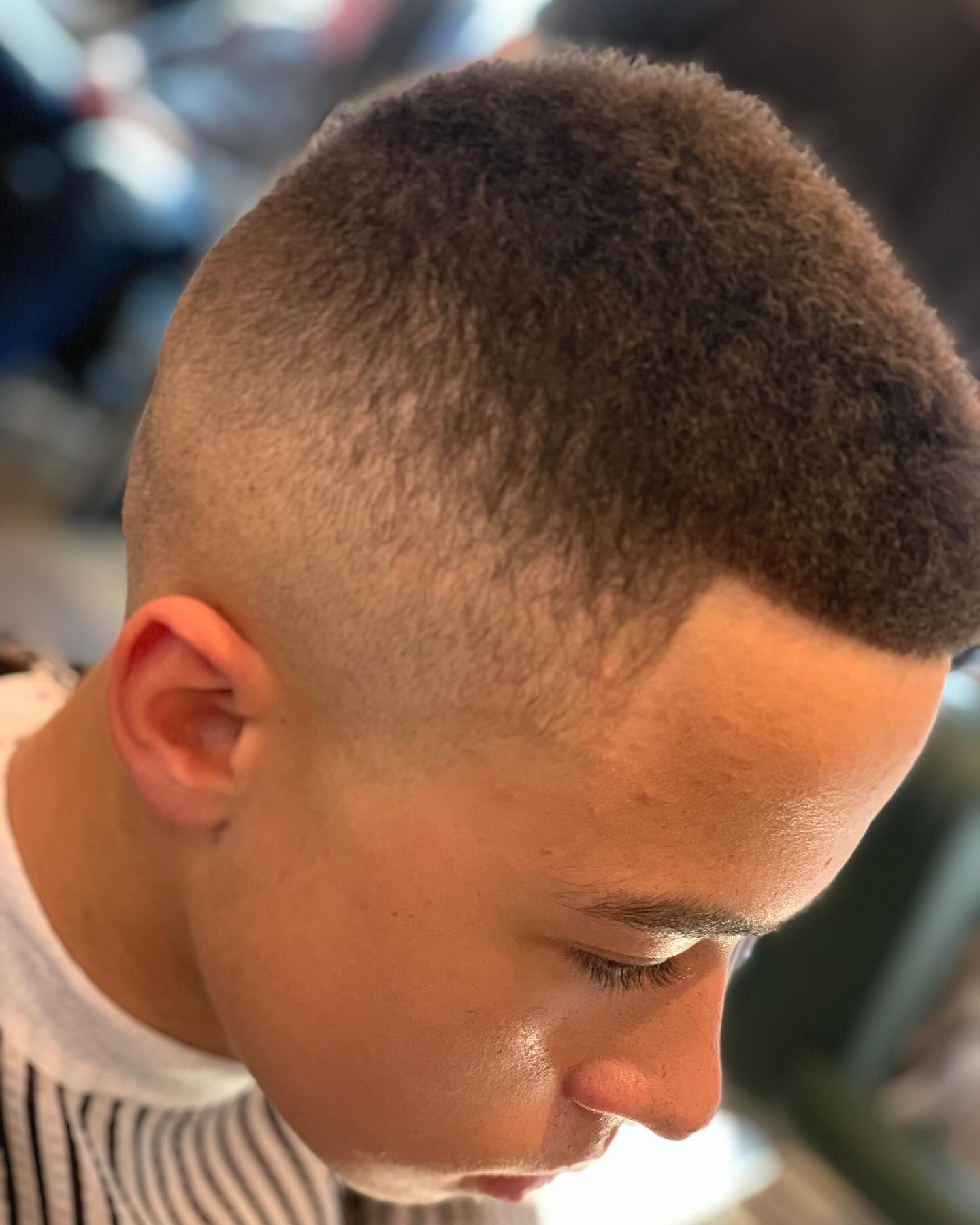 Clipper cut with tapered neckline by barber Kristian Brett